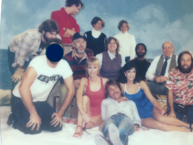 That’s Bo in the baseball cap. His wife and frequent collaborator Dorna is in the bg. in the black shirt with the white turtleneck. . The crew and bathing suit babes are from one of the first commercials we shot in our little stage on Superior Street in Chicago. 